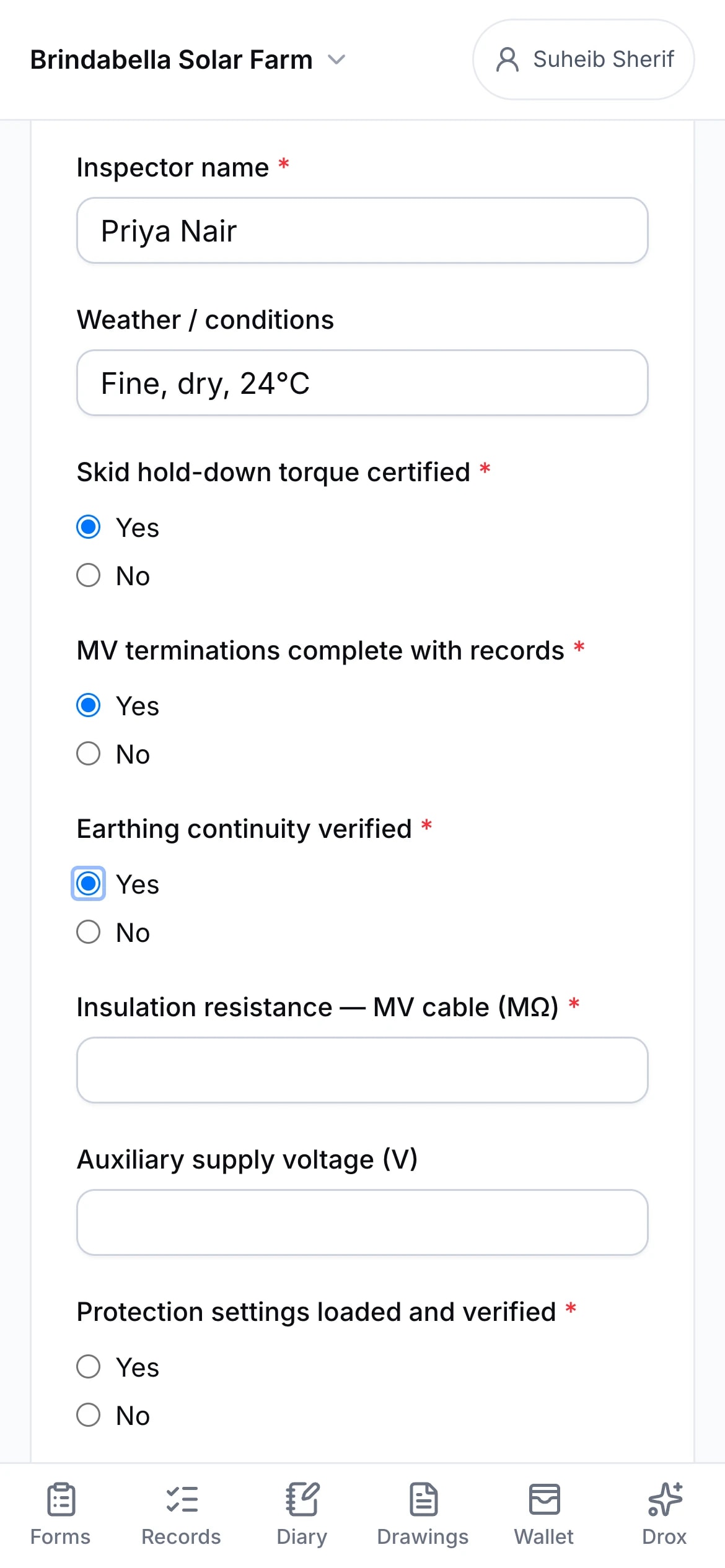 The field app on a phone: a pre-energisation inspection form being filled in.